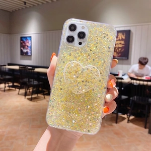 Funda iPhone con purpurina dorada y soporte de corazón a juego para un look de lujo brillo