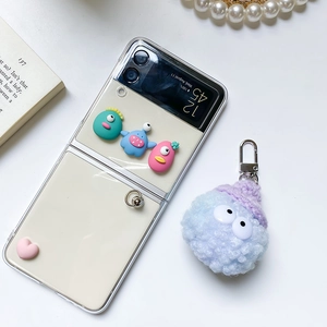 Transparent Samsung Galaxy Z Flip case with 3D cartoon monsters and plush charm