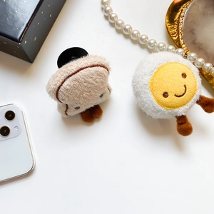 Cute plush toast and fried egg phone grips set with embroidery on white background