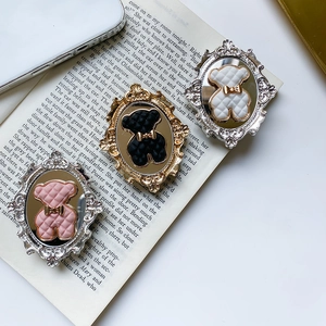 Vintage Baroque bear pop socket phone holder with quilted texture and metal frame