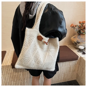 Chic knit tote bag in cream mohair with hollow diamond pattern and leather buckle
