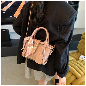Pink transparent PVC bucket bag with inner pouch and checkered silk scarf detail