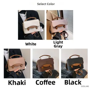 Détail montrant cinq variantes de sacs rétro en cuir grainé dans divers coloris chic