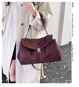 Deep burgundy suede shoulder bag with vintage flap and silver twist lock closure