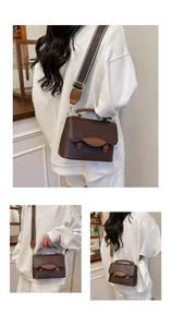 Détail d'un sac à main rétro marron café avec rabat et bandoulière en tissu tissé