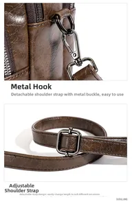 Close-up of brown leather bag with bronze hardware and adjustable shoulder strap detail