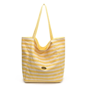 Minimalist yellow and white striped canvas tote bag with long handles and handmade tag