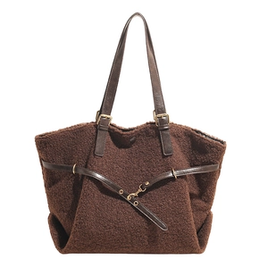 Brown teddy fleece tote bag with leather straps and decorative buckle for autumn