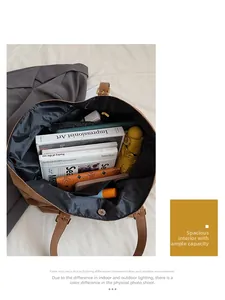 Top view of large brown leather tote bag interior showing spacious storage capacity