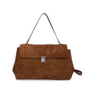 Brown suede shoulder bag with flap closure and silver metal lock in a minimalist design