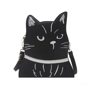 Détail du sac chat noir avec broderie faciale blanche et cuir PU mat de haute qualité