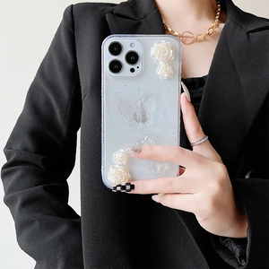 Coque iPhone pailletée avec roses 3D et papillons pour un style chic et élégant
