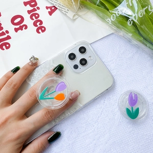 Detail of glitter phone case with a purple tulip expandable folding socket stand