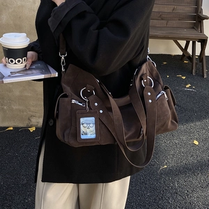 Vintage dark brown large tote bag with matte texture and stylish silver rivet details