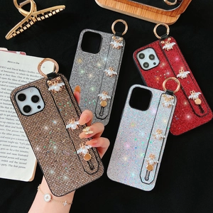 Glitter iPhone case with bee charm and pearl wrist strap in multiple colors