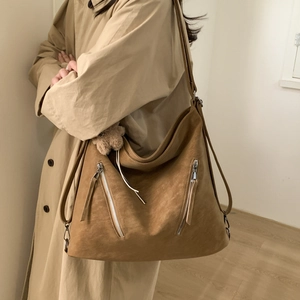 Brown large capacity suede tote bag with metal zippers and cute plush bear pendant