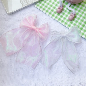 Charming lace bow phone grip with laser coating and iridescent ribbon in pink and white