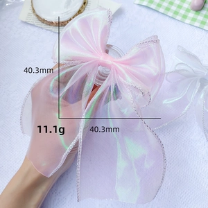 Iridescent pink lace bow phone grip holder with telescopic stand for selfies