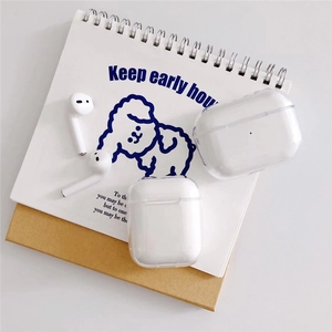 Clear acrylic protective case for AirPods Pro on minimalist desk with notebook