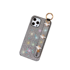 iPhone glitter rhinestones case with pearl bee wrist strap and gold ring holder