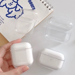Close-up of clear acrylic case for AirPods with protective lanyard hole and split design