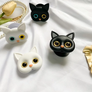 Cute 3D cat head pop socket phone stand set in black and white with colored eyes
