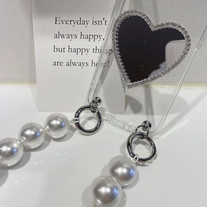Transparent case with heart mirror, rhinestones, and large pearl strap for Samsung devices