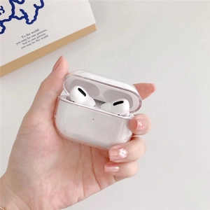 Close-up of clear acrylic protective case on AirPods Pro with minimalist design