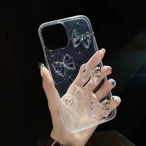 Macro shot of glittery clear iPhone case featuring 3D bow accents in low light