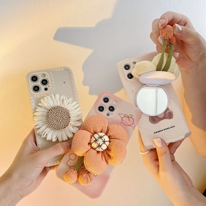 Three cute Japanese style iPhone cases with 3D daisies and flip makeup mirror