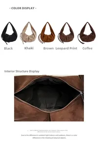 Close-up of suede dumpling bag with zipper closure and spacious interior lining detail