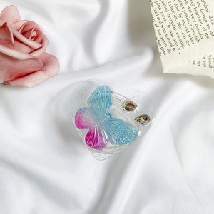 Transparente Herz-Handyhalterung mit blau-violettem Schmetterling und Strasssteinen