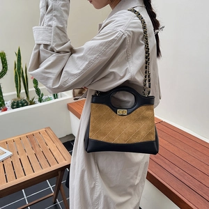 Quilted patchwork chain handbag in brown suede and black leather for crossbody use