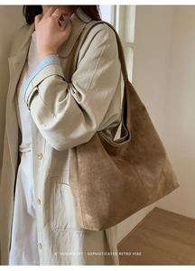 Brown suede hobo bag with large capacity and retro minimalist shoulder strap design