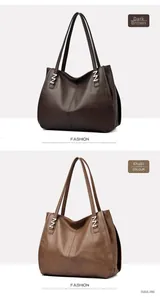 Detail view of large capacity tote bags in dark brown and khaki lychee grain leather