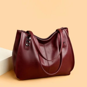 Fashion burgundy large capacity faux leather tote bag with silver M hardware in 45-degree view