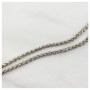 Detail of silver wheat chain texture with durable polished metallic links