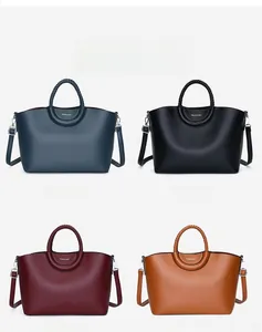 Vue détaillée de quatre sacs en cuir grainé en bleu, noir, bordeaux et couleur caramel