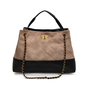 Quilted tote bag in brown and black leather with gold chain strap and turn-lock