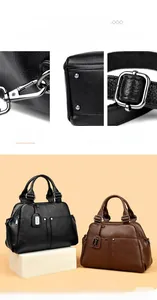 Detail of silver hardware and studs on荔枝 grain texture Boston handbag for women