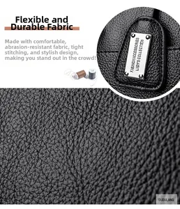 Detail of pebbled leather texture with tight stitching and fashion metal pendant