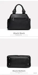 Detail of black pebbled leather Boston bag showing rear zipper pocket and metal feet
