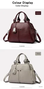 Close-up of premium lychee textured leather Boston bags in burgundy and grey colors