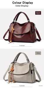 Detail of burgundy and grey handbags showing pebbled texture and wood bead tassels