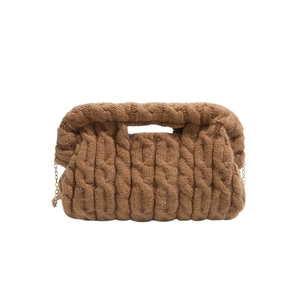 Caramel knitted shoulder bag with twist handle, cloud pleats and gold chain strap