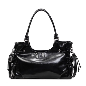 Minimalist black glossy leather tote bag with silver hardware and shoulder strap