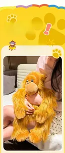 Close-up of realistic long-haired orangutan plush bag featuring soft orange faux fur detail