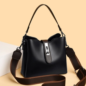 Sac seau élégant en cuir noir avec anses marron et boucle métallique argentée brillante