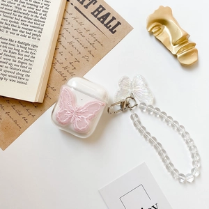 Clear AirPods case with pink bow embroidery and transparent pearl bead bracelet strap