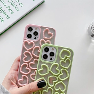 Macro view of iPhone 16 Pro Max case with 3D heart pattern and matte translucent finish
